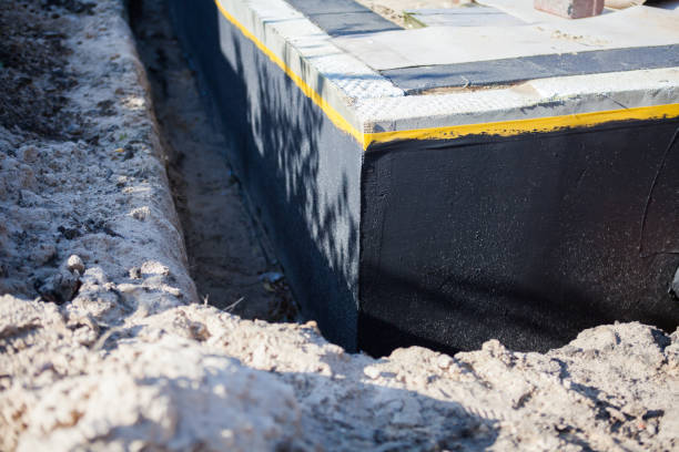 Professional Waterproofing technician working in Syracuse, NY